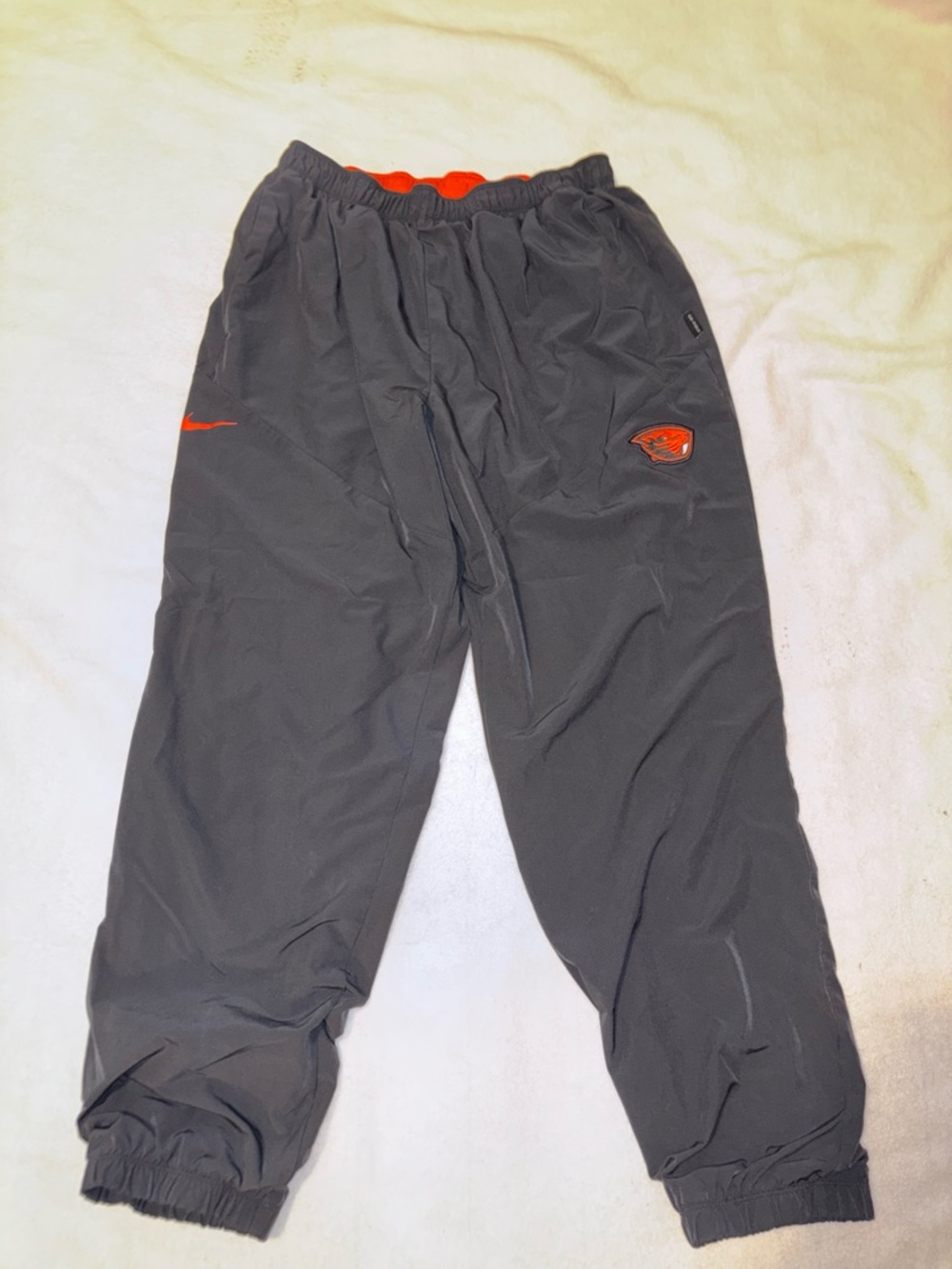 Nike Black Track Pants with Orange Accents